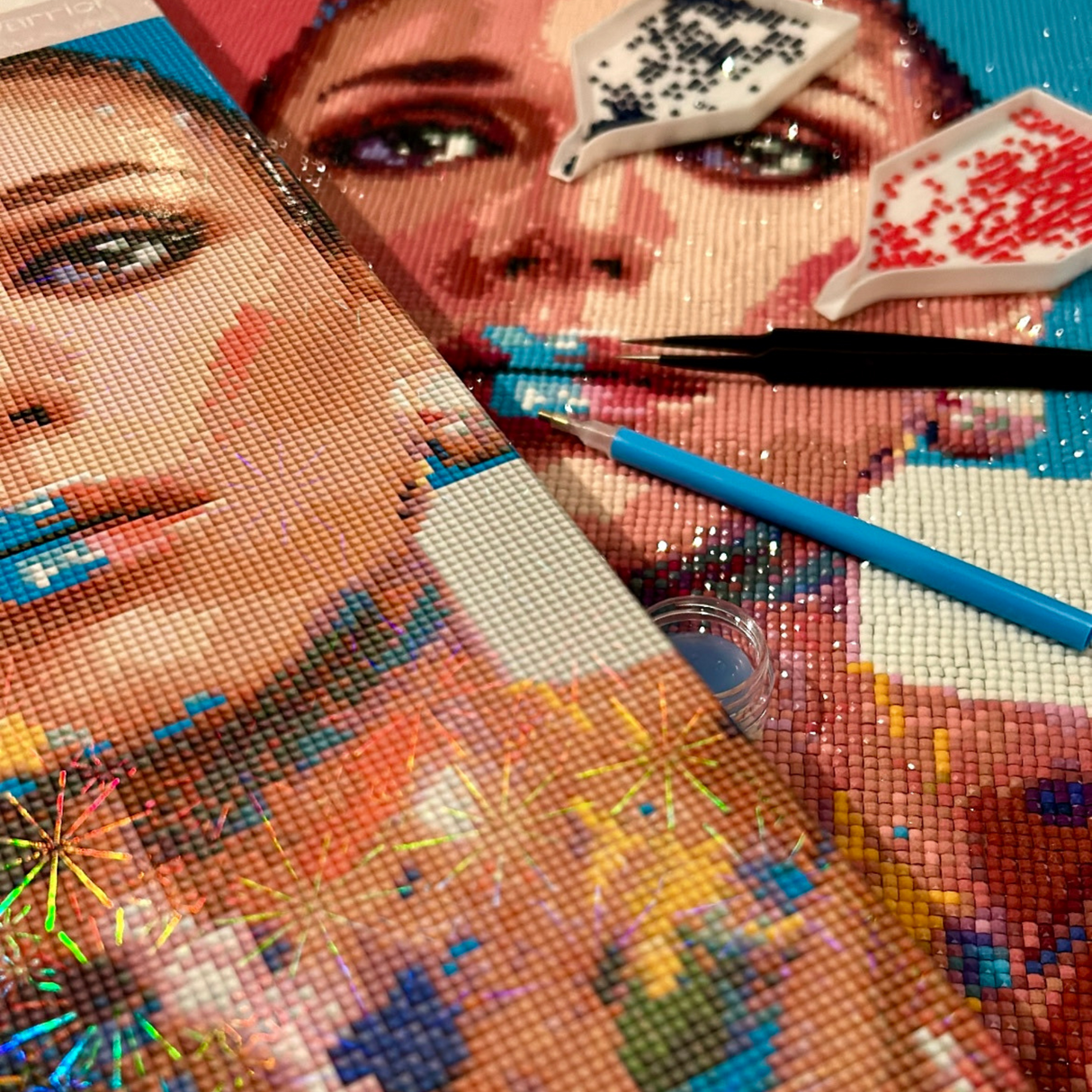 A diamond painting kit depicting a stylized, colorful image of a woman with abstract patterns.